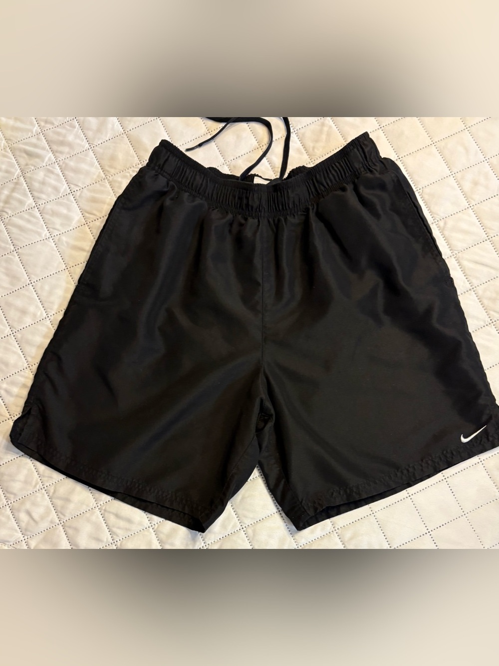 Nike Men’s black athletic shorts.  Size M